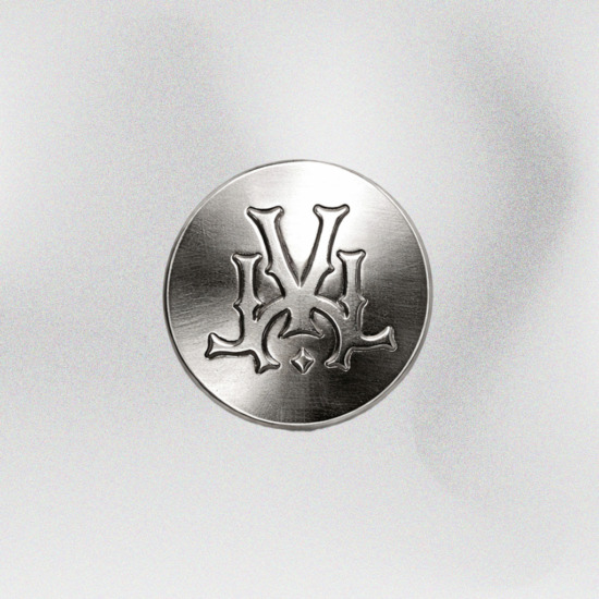 Khuy bấm khắc logo V.C.L